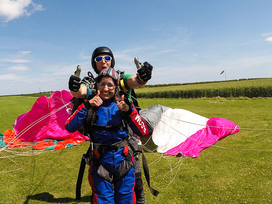 Tandem skydiver after landing