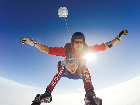 Skydive freefall with sun shining